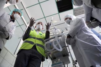 Nurses receive training on using ventilators provided by the World Health Organization in the intensive care ward that was allocated for COVID-19 patients.