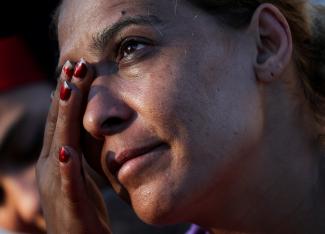 Amira, reacts during an interview at Beirut's central Martyrs' Square where many families fled from the Israeli strikes in southern Beirut.
