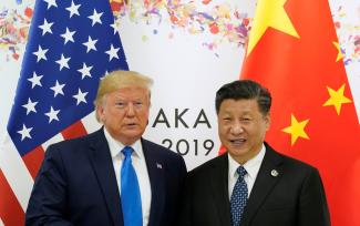 U.S. President Donald Trump and China's President Xi Jinping pose for a photo ahead of their bilateral meeting during the G20 leaders' summit, in Osaka, Japan, on June 29, 2019. 
