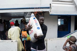 Passengers from Bukavu disembark from the Englebert boat, on its first trip between Bukavu and Goma since the city was taken by M23 rebels, in Goma, Democratic Republic of Congo, on February 18, 2025.
