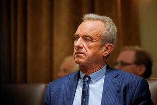Secretary of Health and Human Services Robert F. Kennedy sits as U.S. President Donald Trump hosts his first cabinet meeting, in Washington, DC, on February 26, 2025. 