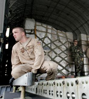 U.S. Air Force servicemen unload humanitarian aid from a U.S. military cargo plane at Tbilisi airport, in Tbilisi, Georgia, on August 14, 2008.