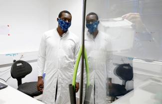 Researchers work on a microbe they say can protect mosquitoes from malaria, at the International Centre of Insect Physiology and Ecology headquarters, in Nairobi, Kenya on, May 11, 2020. 