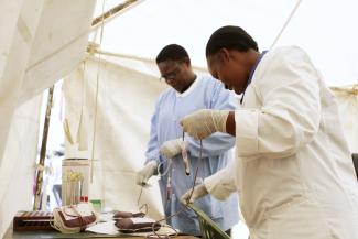 Staff label plastic bags filled with donated blood, in Nairobi, Kenya, on January 9, 2012.