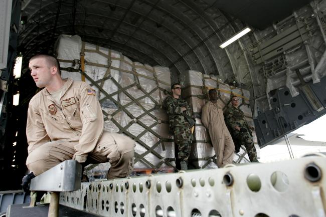 U.S. Air Force servicemen unload humanitarian aid from a U.S. military cargo plane at Tbilisi airport, in Tbilisi, Georgia, on August 14, 2008.